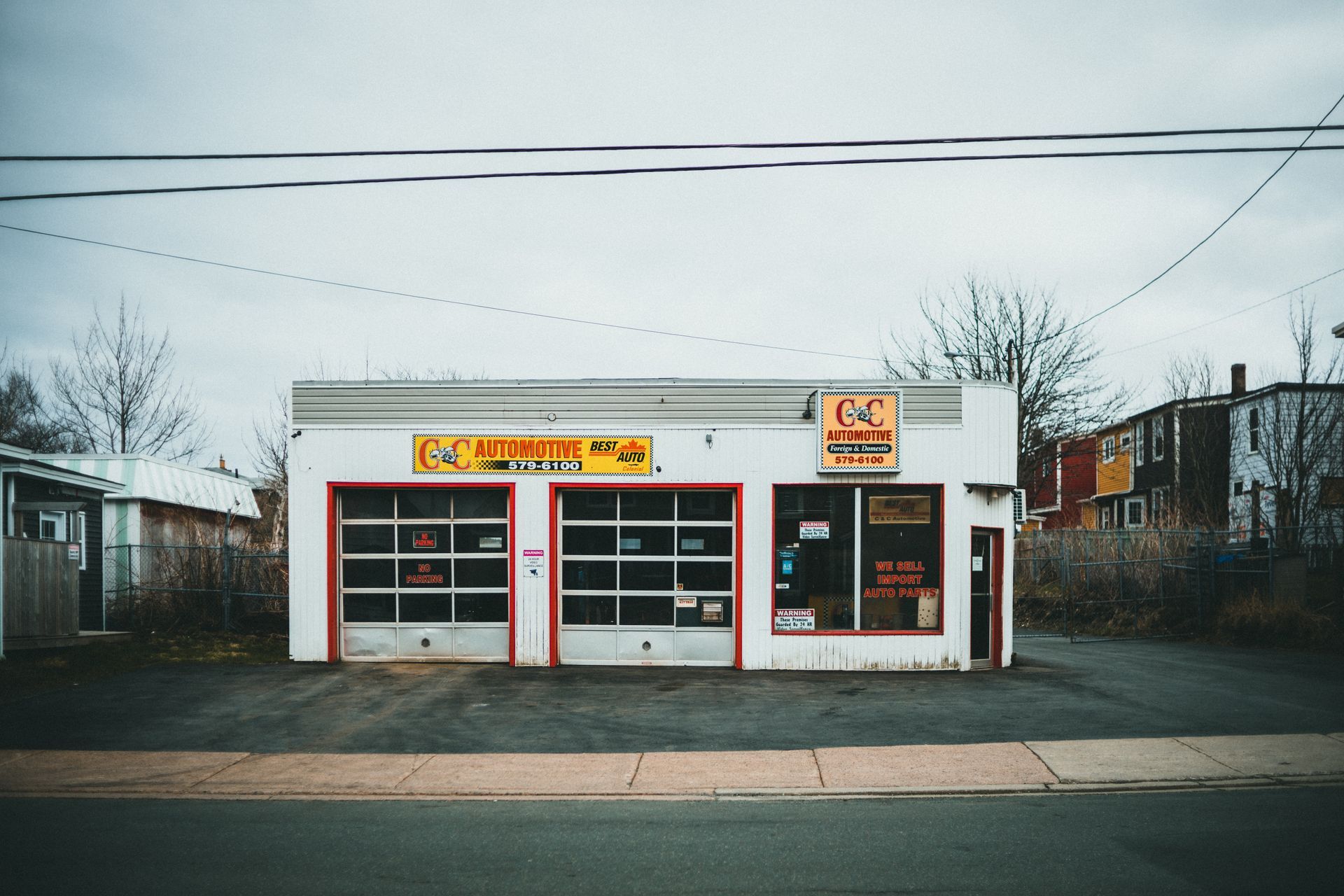 The front of a small independent auto repair shop seen from the road